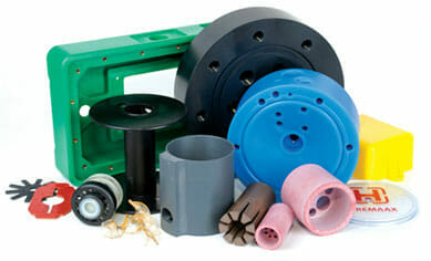 A series of plastic parts made with Delrin material